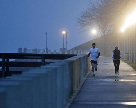 Runners took a jog on the Harborwalk earlier this year. 
