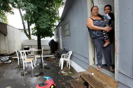 Marisela Ayala, holding grandson Liam, said she and her family have been renting a unit in Lee?s Trailer Park, within a few miles of Suffolk Downs, for the last three months.
