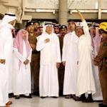 Saudi governor of Mecca region Khaled al-Faisal (C) listened to aides of the Grand Mosque of Saudi Arabia?s holy Muslim city of Mecca on Friday, after a construction crane crashed into it. 