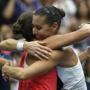 Flavia Pennetta of Italy (R) hugs compatriot Roberta Vinci after Pennetta won their women's singles finals match at the U.S. Open Championships tennis tournament in New York, September 12, 2015. REUTERS/Mike Segar
