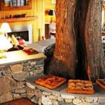 Charter Oak at Winvian Farm is a barn-and-silo-like cottage built around an oak tree, with a Jacuzzi and fireplace.