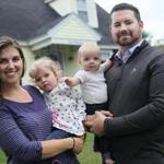 Meggin and TJ Kelly (with Caroline, 2, and Corinne, 6 months) are  moving to Ashburnham and need to sell their home in North Andover. 