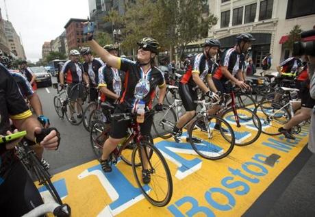 Several hundred cyclists biked from Ground Zero in New York to the Boston Marathon finish line.

