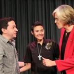 Dylan Lopez was flanked by his father Sebastian Lopez and Representative Katherine Clark. 