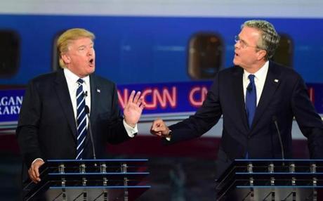 Republican presidential hopefuls Donald Trump and Jeb Bush spoke during the presidential debate at the Ronald Reagan Presidential Library in Simi Valley, California on Sept. 16.
