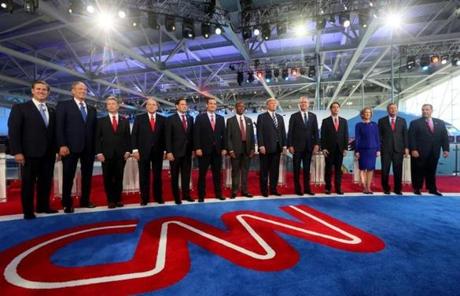 The top 11 Republican presidential candidates posted for a group photo on the night of the second debate, which was hosted by CNN.
