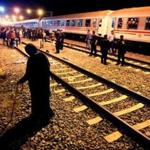A woman walked away from a full train for refugees and migrants in Tovarnik, Croatia, on Friday. Many migrants have tried to cross into Hungary by passing through Croatia. 