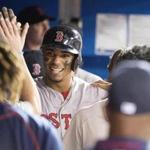 Xander Bogaerts celebrated after scoring the first run ? a homer in the sixth inning ? of Saturday?s game.