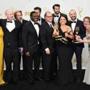 Julia Louis-Dreyfus posed in the press room with the cast and crew of 