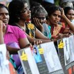 During a demonstration in Sri Lanka, relatives of Tamil activists held placards demanding the release of their loved ones who have been held in detention without trial for long periods of time.