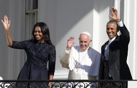 Michelle Obama, Pope Francis, and President Obama waved to the crowds from a White House balcony.

