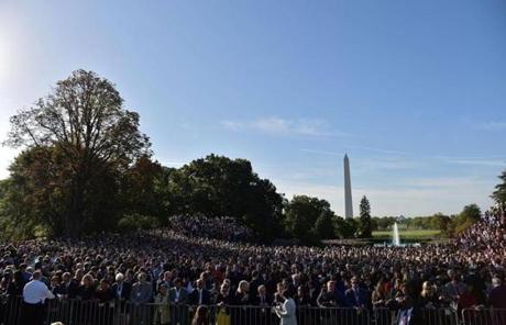 People waited for the arrival of Pope Francis at the White House. 
