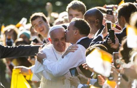 A man kissed Pope Francis outside the Apostolic Nunciature in Washington.
