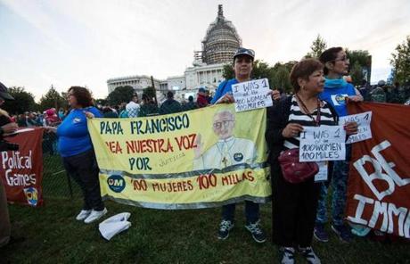 Immigration reform activists held a banner in front of the US Capitol.
