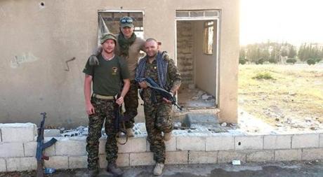 Joshua Washburn (right), a 36- year-old native of Springfield, went to Syria on his own earlier this year to fight with a militia against the Islamic State.
