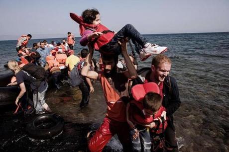 Refugees arrived on the Greek island of Lesbos after crossing the Aegean sea from Turkey on Sept. 21.

