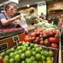 Boston, MA--7/30/2015--Catherine Tracy (cq), left, and Lynda Jarrett (cq) work the produce stand for Stillman's. (The farm is in New Braintree, MA.) The new Boston Public Market officially opens, on Thursday, July 30, 2015. Photo by Pat Greenhouse/Globe Staff Topic: 31publicmarket Reporter: XXX
