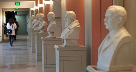 Busts around the atrium of the Tosteson medical center in Harvard Medical school of the famous Harvard medical doctors through out the school?s history. 
