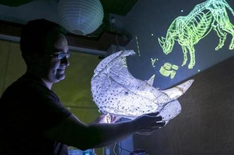Artist David Nunezin tested lighting on his installation ?Requiem for Rhinoceros? at the MIT media lab in Cambridge on Sunday.
