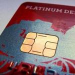 A computer chip is seen on newly issued debit/credit card in this photo illustration taken in Encinitas, California September 28, 2015. Credit card companies have set an October deadline in the United States for the switch to chip-enabled cards, which come with embedded computer chips that make them far more difficult to clone. REUTERS/Mike Blake
