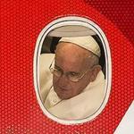 Pope Francis looked out the window of his plane before leaving Philadelphia at the end of his six-day visit to the US on Sunday.