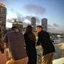 Patrons drink in a view of Boston?s skyline from the Envoy Hotel?s Lookout rooftop bar.