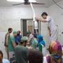 Afghan surgeons work in an undamaged part of the MSF hospital in Kunduz after the operating rooms were destroyed in an air strike.