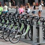 Hubway bikes were available in Copley Square this summer. The bike-share system has locations set to open this week. 