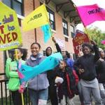 Boston residents protesting the city?s housing  situation marched Saturday along Charles Street in Fields Corner.