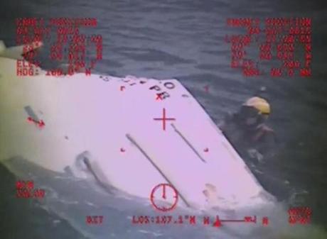 A Coast Guard helicopter crew investigated a lifeboat Sunday that was found from the missing ship El Faro.
