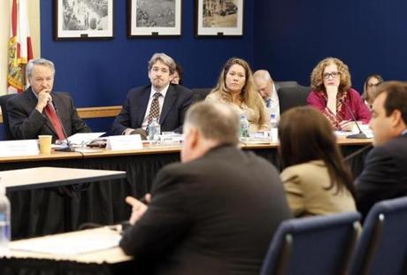 Experts presented information on predictive analytics to the Commission to Eliminate Child Abuse and Neglect Fatalities at the Children's Board of Hillsborough County in July 2014 in Tampa, Fla.
