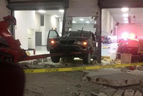 The SUV hit an interior cinder block wall.
