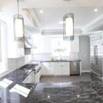 The kitchen counters are topped with Grigio Carnico marble from Italy.