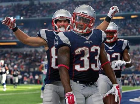 Dion Lewis celebrated with Danny Amendola after he scored a third quarter touchdown.
