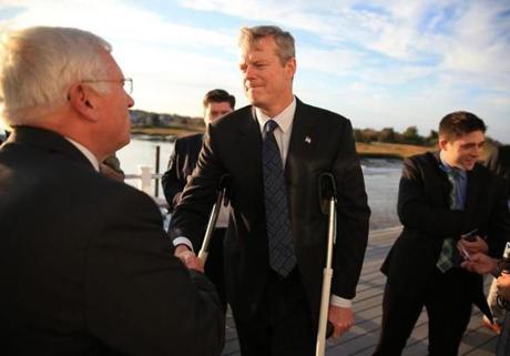 Scituate resident Charlie Wall (left) greeted Governor Charlie Baker after the grants were announced.
