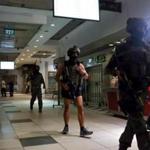 Israeli special forces searched Wednesday inside a Jerusalem bus station after police said a Palestinian had stabbed a woman.