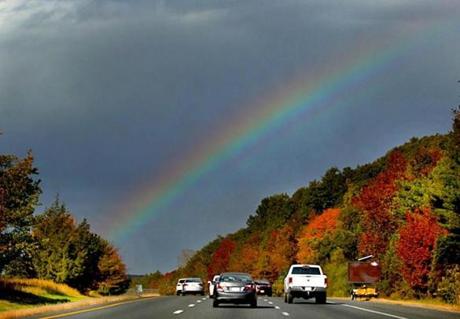 A rainbow was seen over Route 495 in Mansfield as rain showers moved through the area Friday morning.
