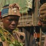 Abraham Attah (far left) and Idris Elba in ?Beasts of No Nation.?