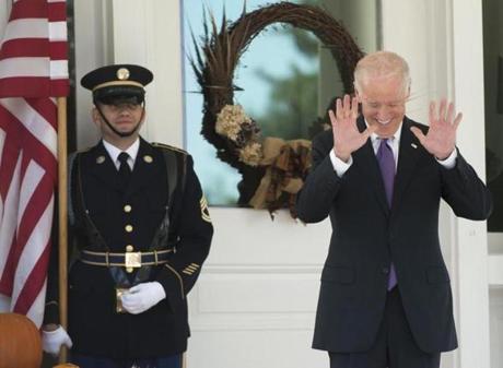 Vice President Joe Biden reacted on Wednes-day as reporters asked if he had made a decision on whether to run for president.

