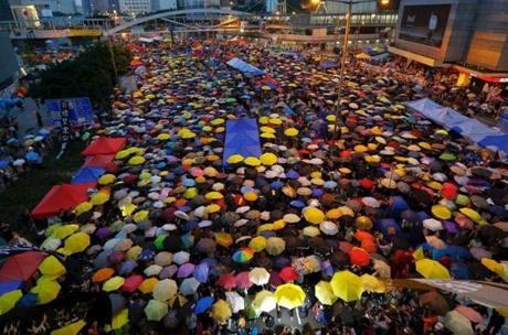 Protesters opening their umbrellas, symbols of the pro-democracy movement, in 2014.
