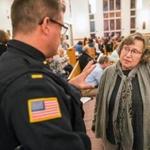 Lieutenant Dave Brown spoke with ECCO member Karen Brown at a meeting between Lynn police and residents held at Zion Baptist Church.