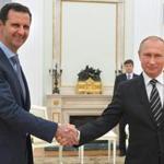 Syrian President Bashar Assad (left) shook hands with Russian President Vladimir Putin on Wednesday at the Kremlin in Moscow.