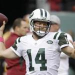 New York Jets quarterback Ryan Fitzpatrick warms up prior to an NFL football game against the Washington Redskins, Sunday, Oct. 18, 2015, in East Rutherford, N.J. (AP Photo/Seth Wenig)