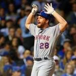 Daniel Murphy celebrates homering in his sixth consecutive playoff game ? a postseason record.