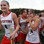 Watertown, MA: 10-21-15: Watertown's field hockey team, including (l-r, foreground) captain Ally McCall, captain Michaela Antonellis, and Kourtney Kennedy celebrate their win over Melrose at Victory Field in Watertown, Mass. October 21, 2015. The game was Watertown's 154th without a loss, a national record. Photo/John Blanding, Boston Globe staff story/, Sports ( 22watertown) )