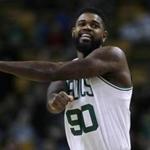 Celtics forward Amir Johnson credited Detroit Pistons veterans for teaching him lessons on and off the court.