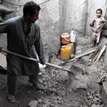 A man removed debris from his damaged walls after an earthquake in Jalalabad, Nangarhar province, Afghanistan, on Monday.