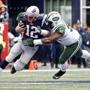 Foxborough MA 10/25/15 New England Patriots quarterback Tom Brady is sacked by New York Jets Sheldon Richardson for a 4 yard loss during second quarter action at Giillette Stadium on Sunday October 25, 2015. (Matthew J. Lee/Globe staff) Topic: Patriots-Jets Reporter: 