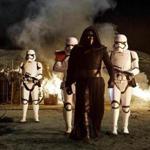 Kylo Ren (Adam Driver) with Stormtroopers in ?Star Wars: The Force Awakens.?