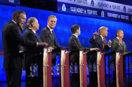 John Kasich, left, and Donald Trump, second from right, argued across fellow candidates during the Republican debate.
